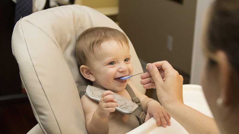 newborn baby eating